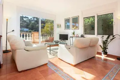 Zona de estar de Villa con piscina privada en Begur