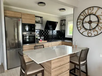 Una cocina o zona de cocina en Casa de Verano