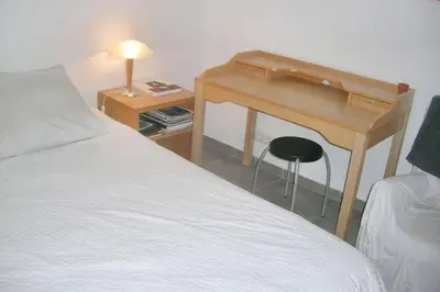 Cama o camas de una habitación en Charming Apartment in Palamós with Sea View and Terrace - 65 sqm