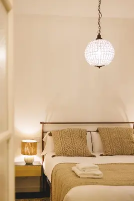 Cama o camas de una habitación en Bravissimo Mercaders 3, Old Town Oasis