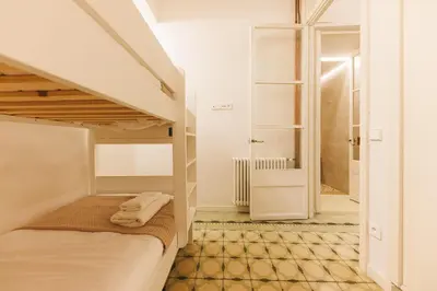 Cama o camas de una habitación en Bravissimo Mercaders 3, Old Town Oasis
