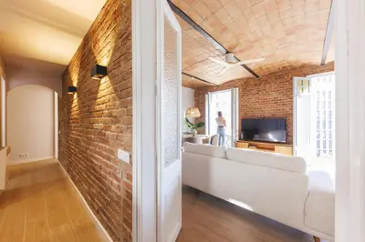 Una televisión o centro de entretenimiento en Bravissimo Marquès de Camps, 3-bedroom apartment
