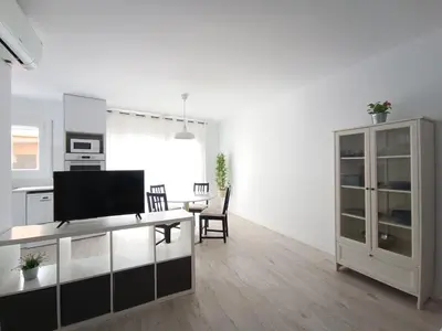 Una televisión o centro de entretenimiento en Aiguaneu S'Auguer