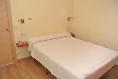 Cama o camas de una habitación en Aiguaneu Sa Marina