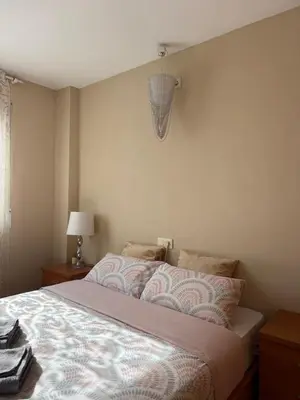 Cama o camas de una habitación en Apartamento MARINA PLAYA, primera linea de mar