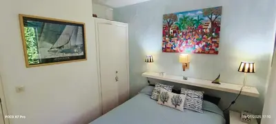 Una televisión o centro de entretenimiento en Begur-Sa Tuna-Costa Brava-Rent House with Pool
