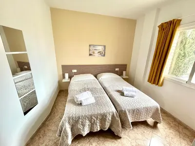 Cama o camas de una habitación en Kesito Family Apartments