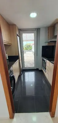Una cocina o zona de cocina en Ático con gran terraza y vistas al mar