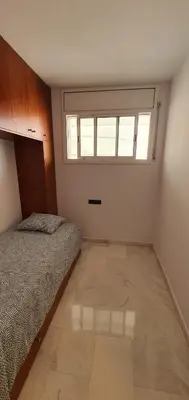Cama o camas de una habitación en Ático con gran terraza y vistas al mar
