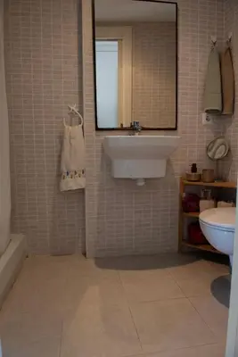 Un baño de Apartamento céntrico con parking cerca de la playa