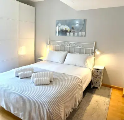Cama o camas de una habitación en Apartamento céntrico con Parking en Palamos