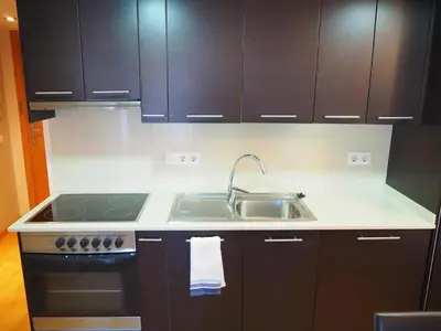 Una cocina o zona de cocina en Apartamento céntrico con Parking en Palamos
