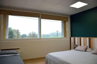 Cama o camas de una habitación en Apartament rural Can Ramon