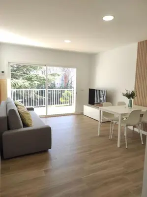 Zona de estar de Apartamento Reformado con Aparcamiento. Playa 5min a pie.