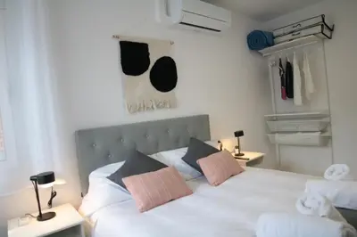 Cama o camas de una habitación en Modern Apartament al costat del Parc de la Devesa