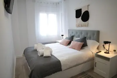 Cama o camas de una habitación en Modern Apartament al costat del Parc de la Devesa