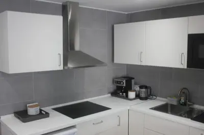 Una cocina o zona de cocina en Apartamento primera línea de mar
