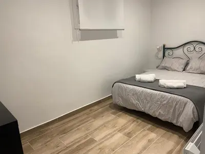 Cama o camas de una habitación en APARTAMENTO EN LA PLAYA