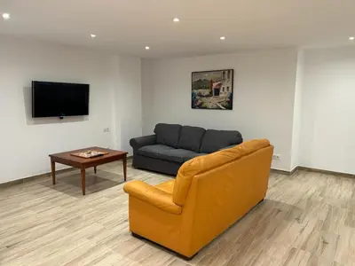 Una televisión o centro de entretenimiento en APARTAMENTO EN LA PLAYA