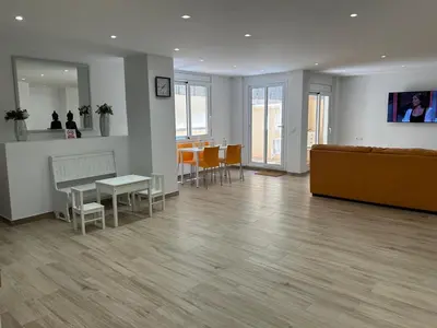 Una televisión o centro de entretenimiento en APARTAMENTO EN LA PLAYA