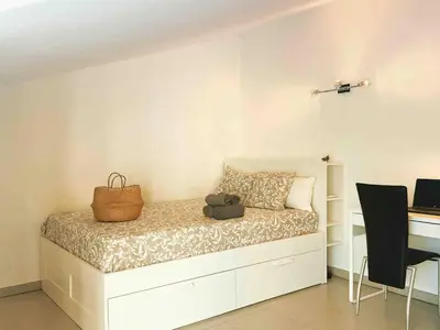 Cama o camas de una habitación en Duplex Piscina y Parking MasBlau Beach by Host&Joy