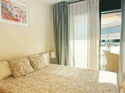 Cama o camas de una habitación en Duplex Piscina y Parking MasBlau Beach by Host&Joy