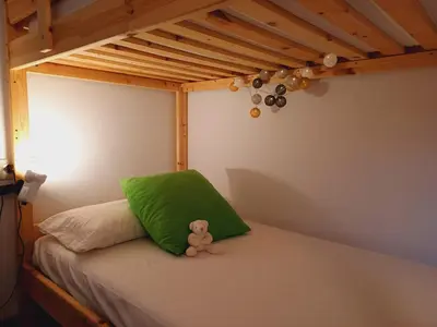 Cama o camas de una habitación en Apartamento con piscina y wifi cerca de la playa