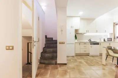 Una cocina o zona de cocina en Bravissimo Mercadal Duplex, with 2 bedrooms