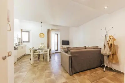 Una televisión o centro de entretenimiento en Bravissimo Mercadal Duplex, with 2 bedrooms