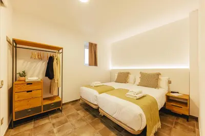 Cama o camas de una habitación en Bravissimo Mercadal 3, one-bedroom plus sofa bed