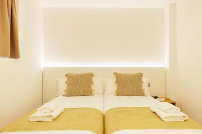 Cama o camas de una habitación en Bravissimo Mercadal 3, one-bedroom plus sofa bed