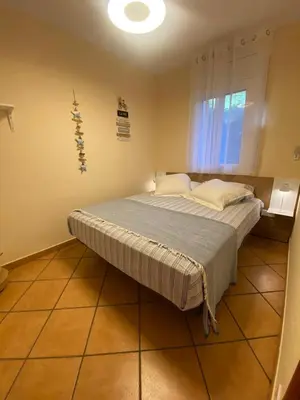 Cama o camas de una habitación en Rincón de Aigua Xelida