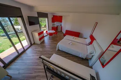 Cama o camas de una habitación en Villa Mitjorn Cala Canyelles