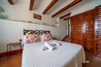 Cama o camas de una habitación en Villa Mitjorn Cala Canyelles