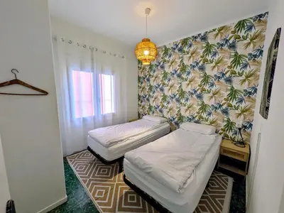 Cama o camas de una habitación en THE ROOM - APARTMENT IN LLORET