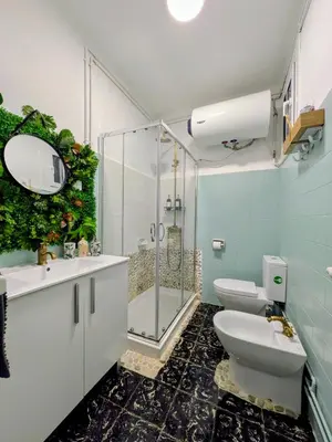 Un baño de THE ROOM - APARTMENT IN LLORET