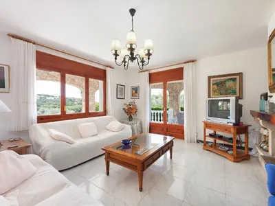 Una televisión o centro de entretenimiento en Holiday Home Mas Vila by Interhome
