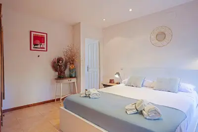 Cama o camas de una habitación en Encantadora casa en Peratallada