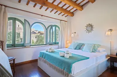Cama o camas de una habitación en Encantadora casa en Peratallada