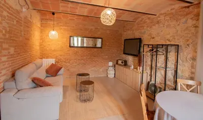 Una televisión o centro de entretenimiento en El Molí de Fornells