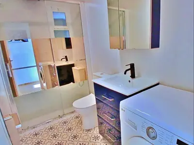 Un baño de Apartamento en primera linea de mar