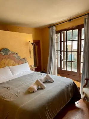 Cama o camas de una habitación en SATUNA CASA TÍPICA MAR