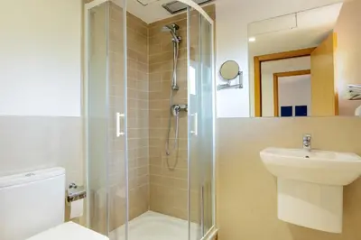 Un baño de Apartamentos Tossa Dreams by Pandora Hoteles