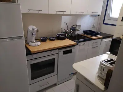 Una cocina o zona de cocina en T3 de 65 m2 terrasse jardin à 300 m de la mer