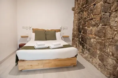 Cama o camas de una habitación en Elena Apartments Girona