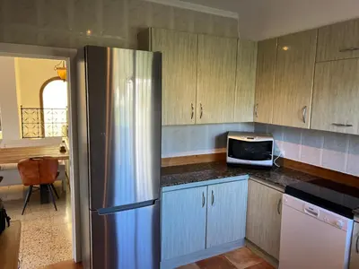 Una cocina o zona de cocina en Villa zeezicht
