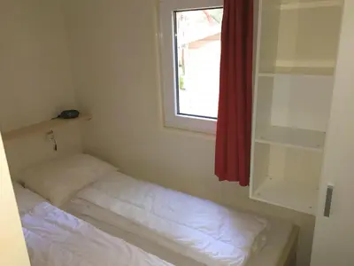Cama o camas de una habitación en Cozy Glamping Chalet in Palams with Garden View