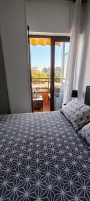 Cama o camas de una habitación en Apartamento céntrico Playa de Aro con piscina.