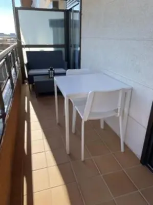 Un balcón o terraza de Apartamento céntrico Playa de Aro con piscina.