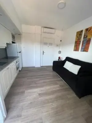 Una cocina o zona de cocina en Apartamento céntrico Playa de Aro con piscina.